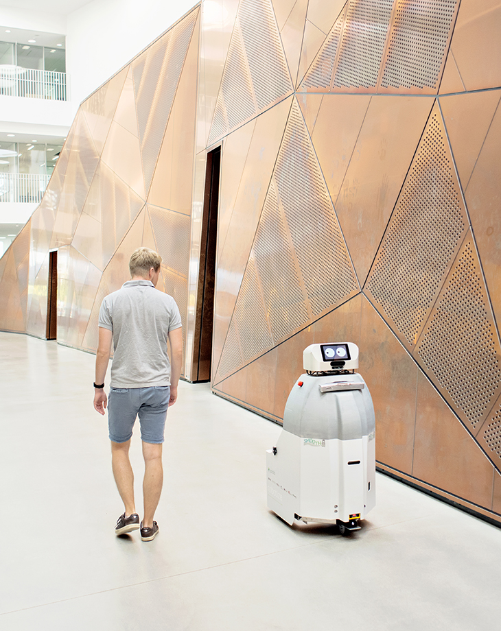 A man and a robot.