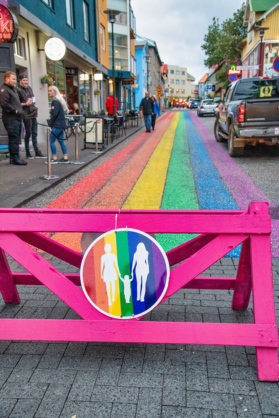 Rainbow coloured pedestrian street with PRIDE-theme in Reykjavik.