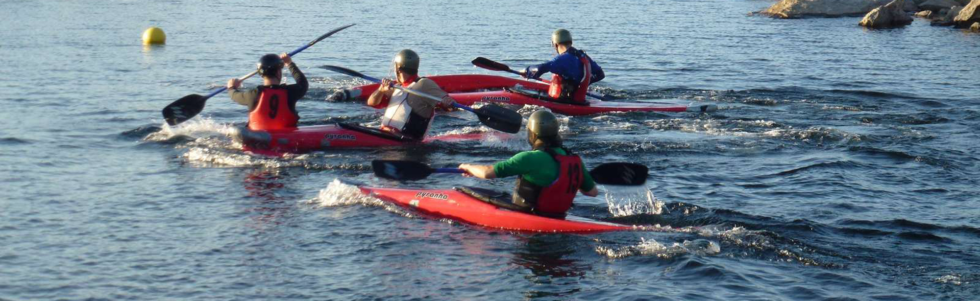 Four persons kayaking