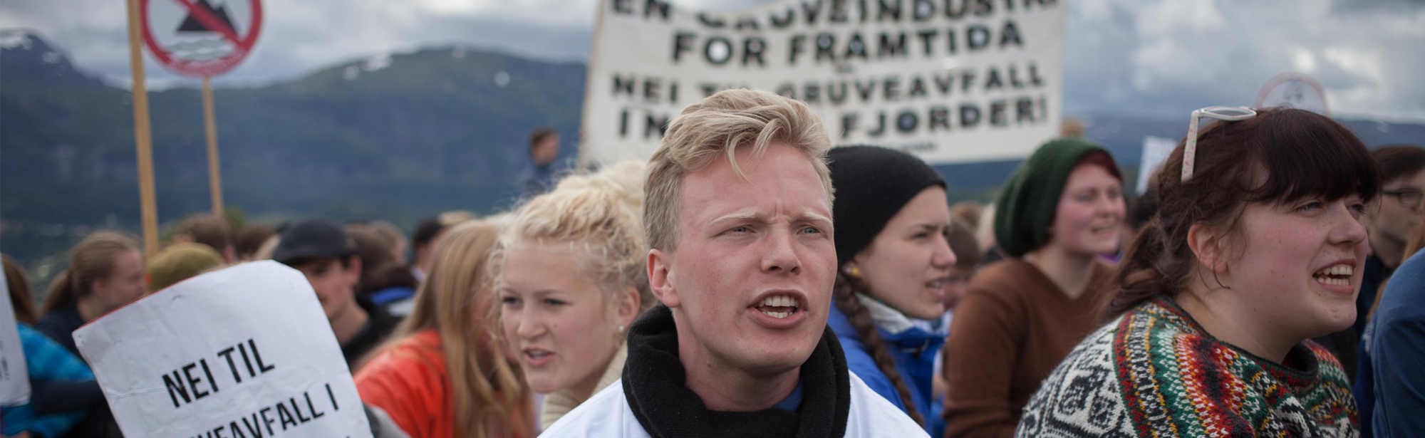 Young people demonstrating against mining plans