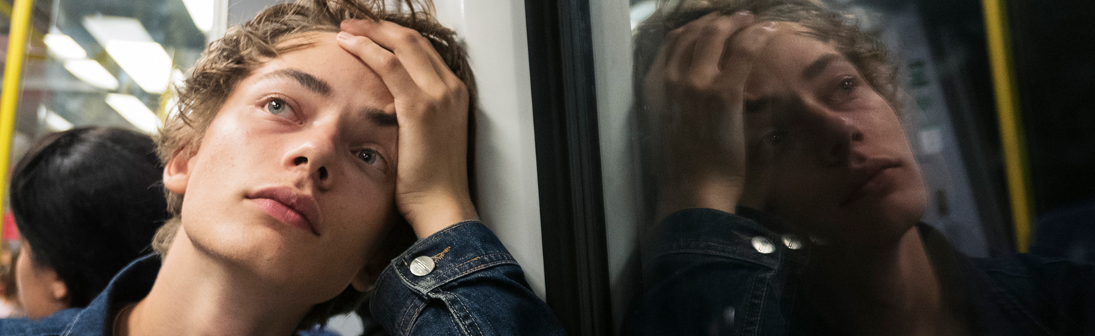 Young person in metro
