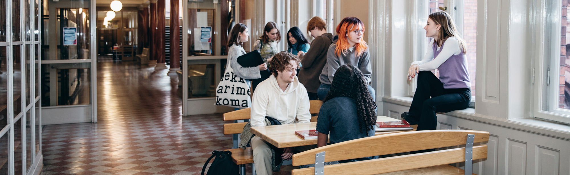 Group of students in school corridor